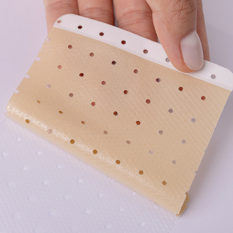 Perforated Elastic Fabric Silicone Patch